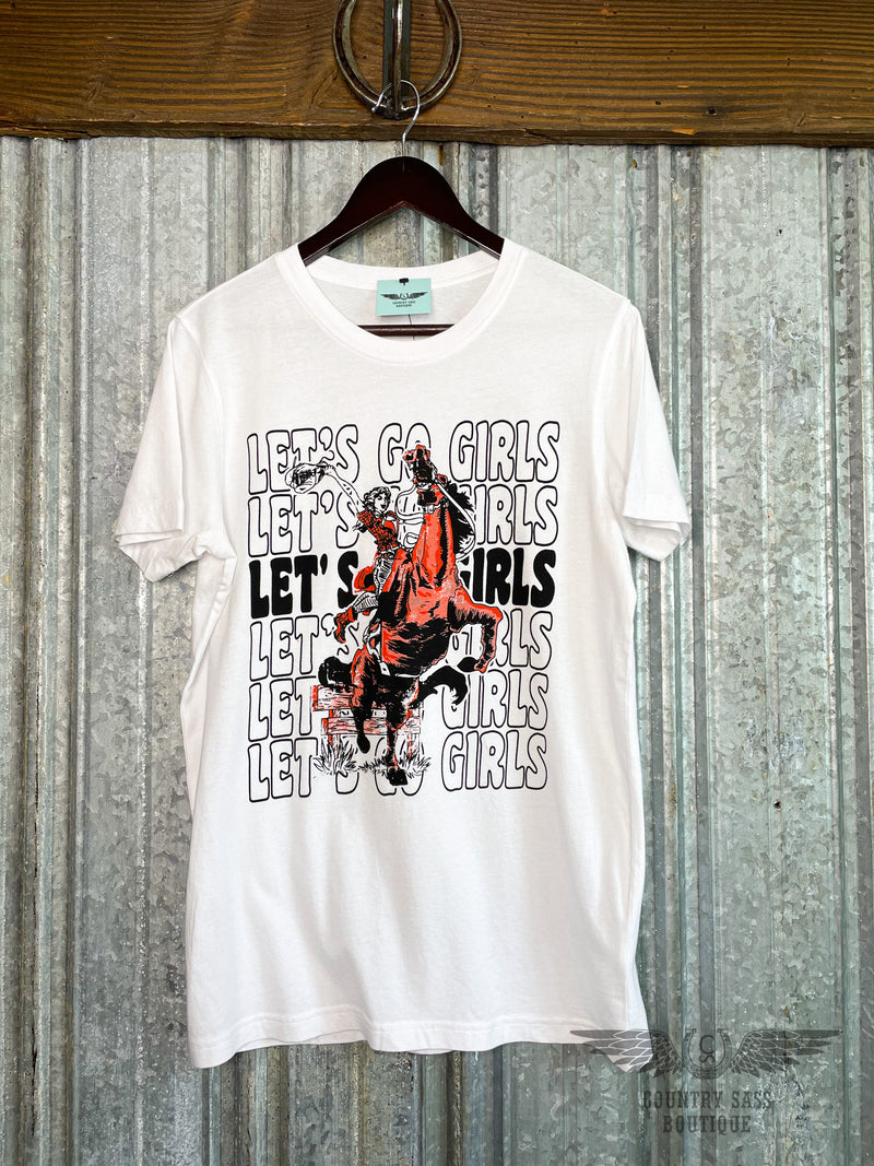 Image of white tee shirt with black and white graphics of "Let's go girls" printed 6 times down the front and a cowgirl riding a rearing horse.