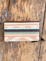 Photo of back of pastel aztec woven fabric wallet